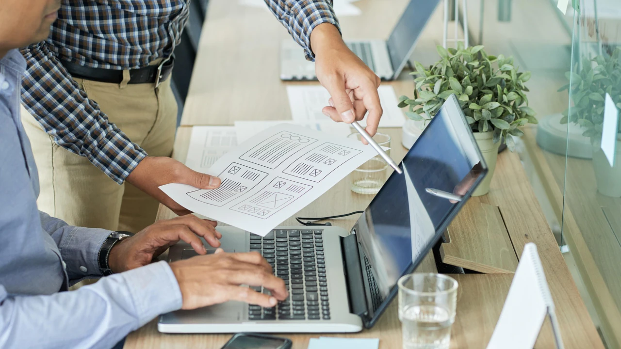 Web developers working on website